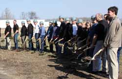 The Hydratight team picks up shovels of dirt at today's ground breaking ceremonies.