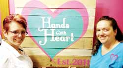 Hands with Heart owner Jill Lewandowski, left, and manager Becky Maus.
