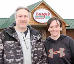 Dominic Badalamenti, owner of Luigi's, and local manager Fawn Kennedy outside the new Antigo location, the former Refuge Restaurant.