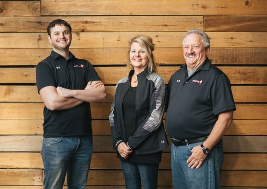 Three proud proprietors of Schumitsch Seed Inc. include, from left to right, Jay, Penny and Scott Schumitsch. (Photo: Courtesy of Travis Dewitz)