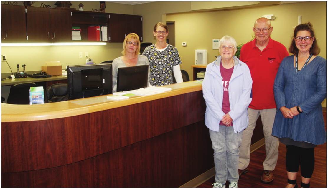 From left, Danna Emerich, certified medical assistant and Jolene Derfus, patient service
representative, with Judy Popelka, Dave Krochalk and Reba Rice,
CEO of NorthLakes Community Clinic at the White Lake Clinic.