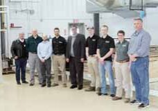 Shown standing in front of the new kiln at the Wood Technology Center are, from left, Jim Rosenberg, Wisconsin Economic Development Corporation; Scott Bowe, University of Wisconsin-Extension; Scott Lyon, Wisconsin Department of Natural Resources and Great Lakes Kiln Drying Association; Travis Allen, Northcentral Technical College; Vincent Rice, Wisconsin Economic Development Cooperation; students Dylan O'Gorman, Dakota Kakes and Jessica Becker; and Troy Brown, Kretz Lumber.