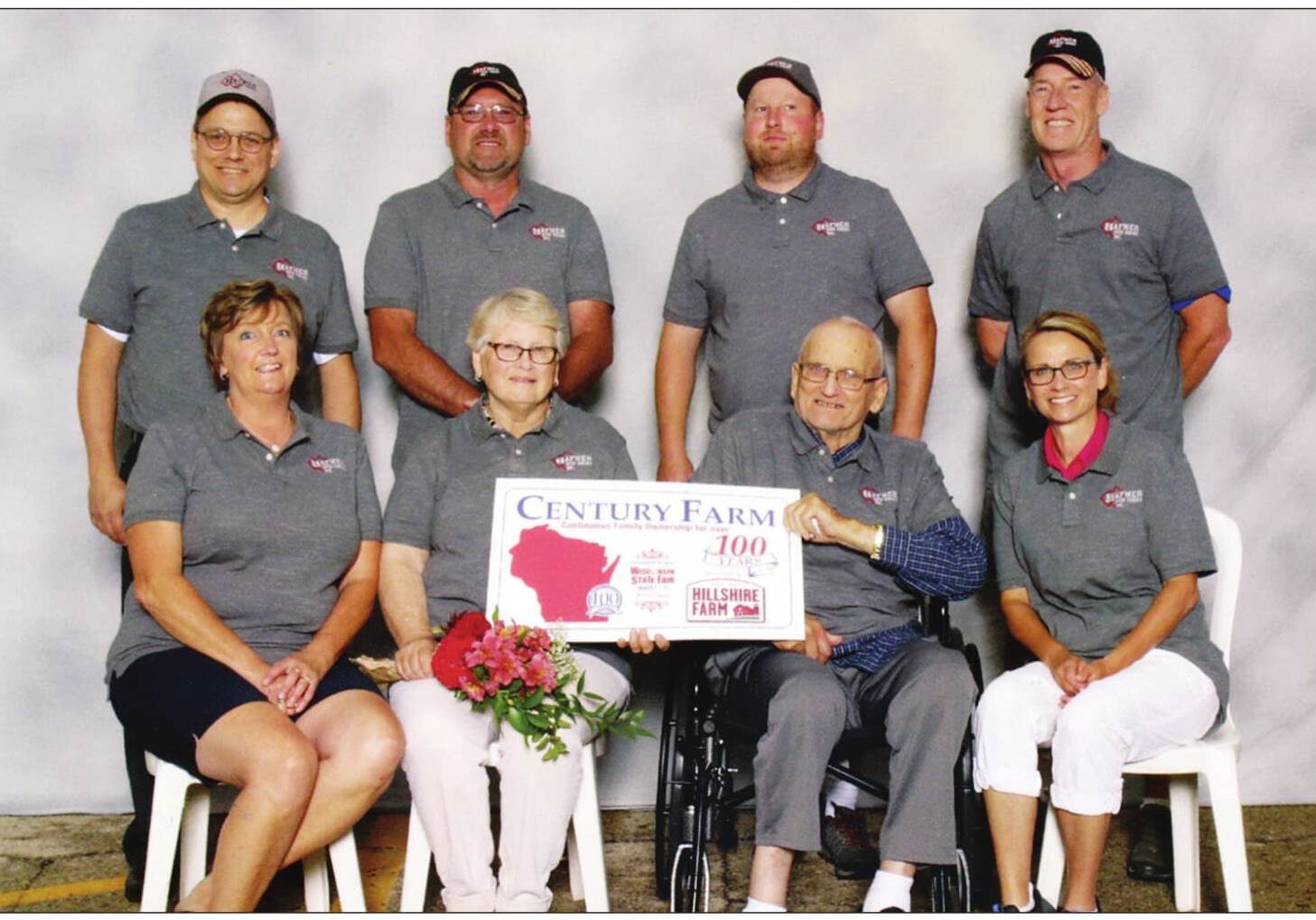 Shown at the Century Farm presentation for Hafner Seed Farms Inc. are, from left, (front row) Patty Hafner,
Leilani Hafner, John Hafner, Deb (Hafner) Burton, (back row) Greg Hafner, Dave Hafner, Kevin Hafner and Tim Burton.