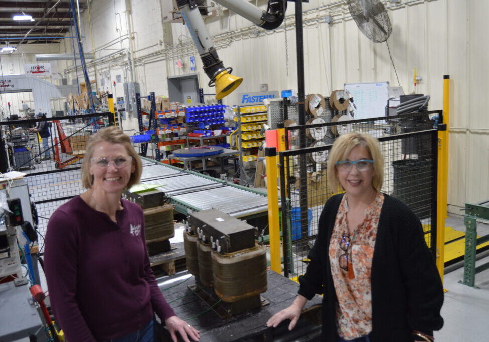 Angie Close, LCEDC Executive Director, and Julie Berndt, Johnson Electric Coil owner discuss funding options for the purchase of Johnson Electric Coil.