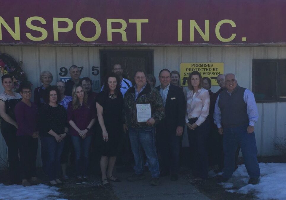 Jil and Karl Schulz, at center, with Karl’s Transport employees, Rep. Mary Felzkowski
and John Spiros, and Sen. Tom Tiffany.