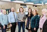 Rep. Mary Felzkowski, center, receives the legislator of the Year Award from members of the Antigo Public Library Board on behalf of the Wisconsin Valley Library Service.