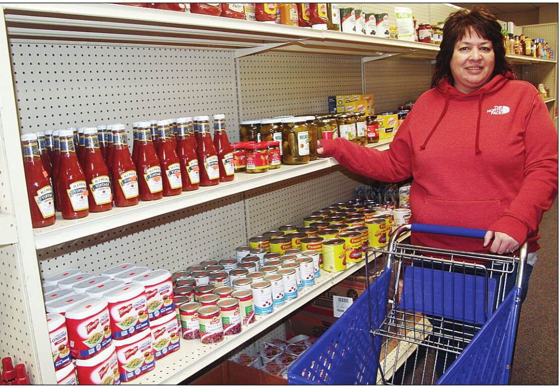 Kim Woyak is now serving customers at Savers Food Mart.