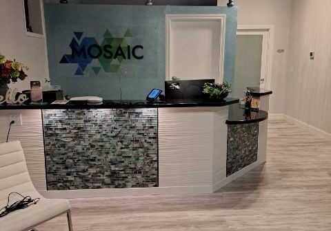 The reception desk in the lobby of Mosaic Massage and Float Center.